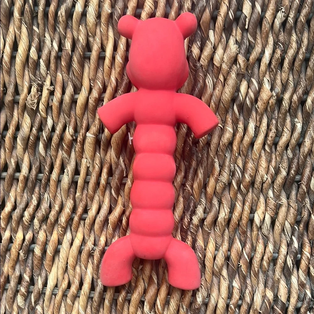 Red and Blue Dog Toy with Whimsical Design